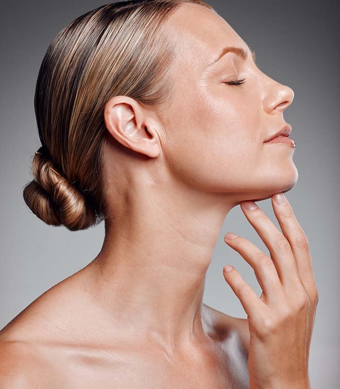 Profile, relax and skincare of mature woman in studio for glow,
